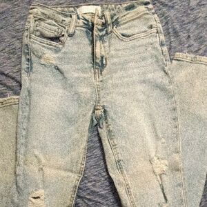 High-Rise Light Blue Skinny Jeans with Subtle Distressing